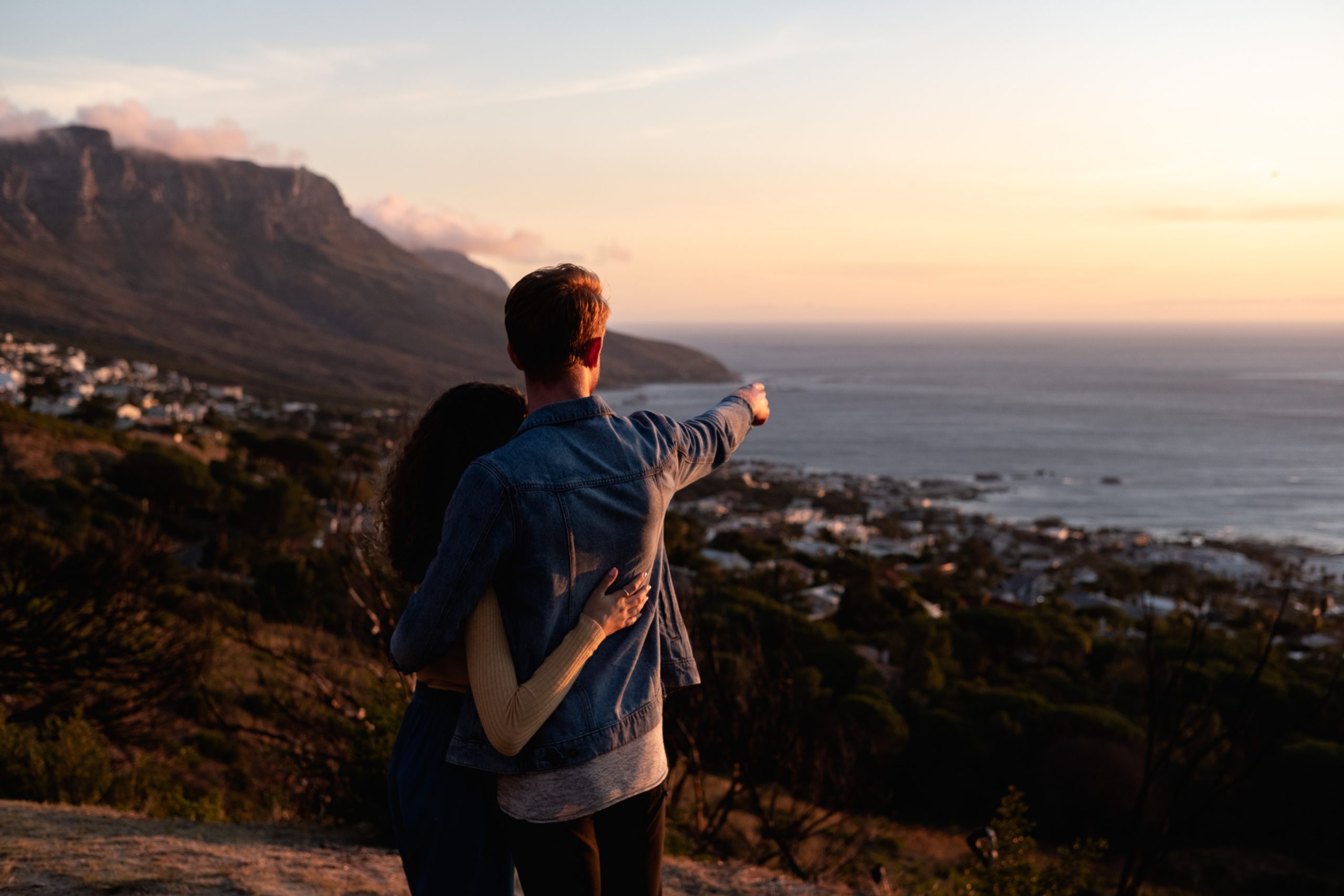 featured image of couple looking at beach for Bitcoin article