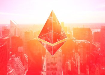 Picture of an ethereum symbol above a city with a red hue