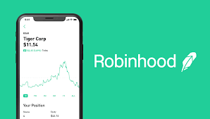 Image of a mobile phone with Robinhood app with Robinhood written to the left of it. Image has a green background