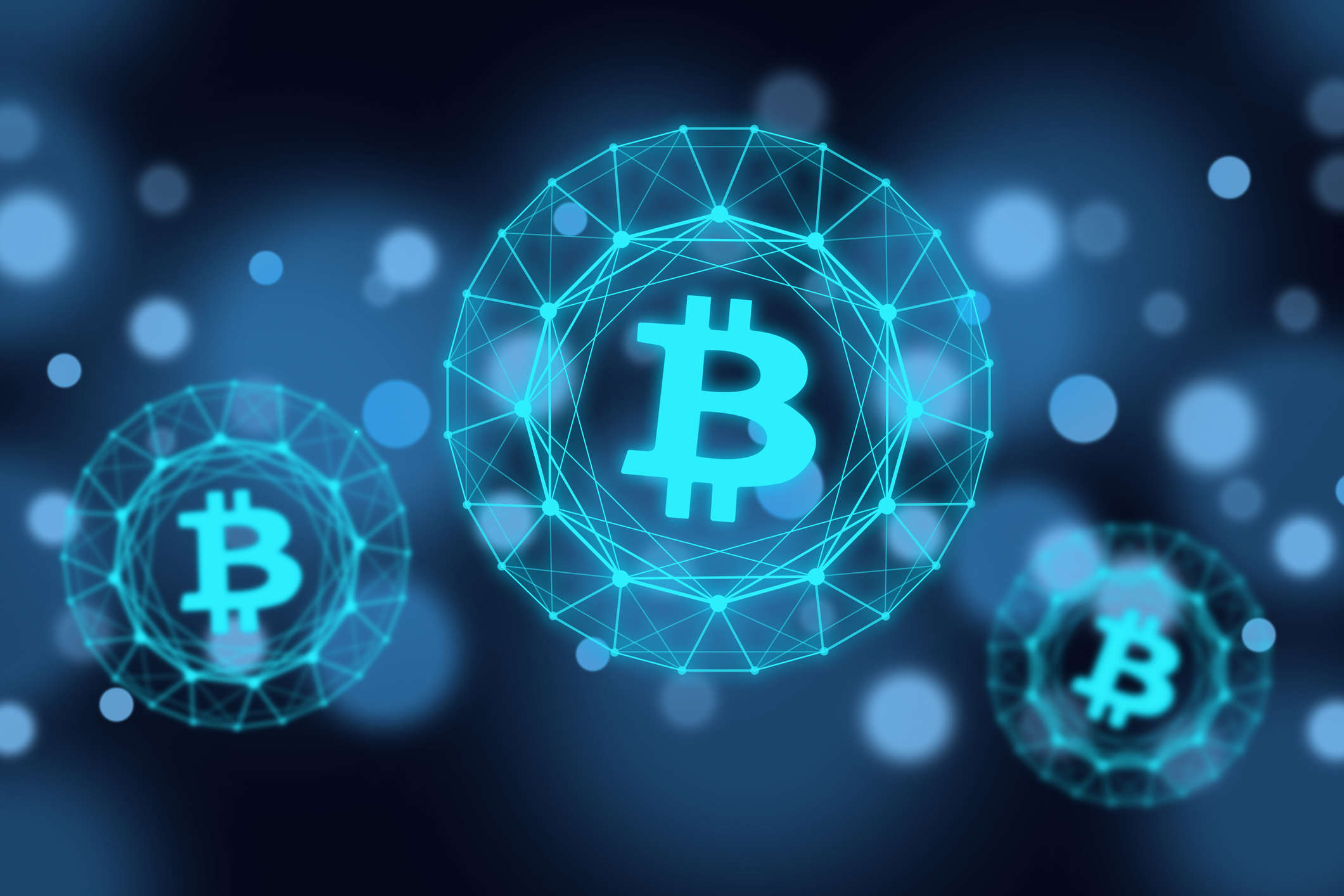 Picture of bitcoin logos in light blue bubbles