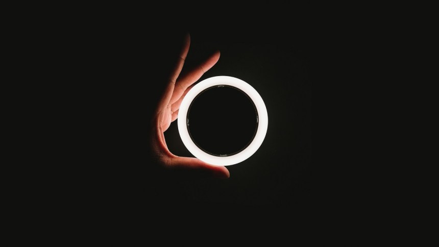Circle, a hand with a white circle