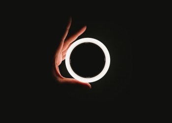 Circle, a hand with a white circle