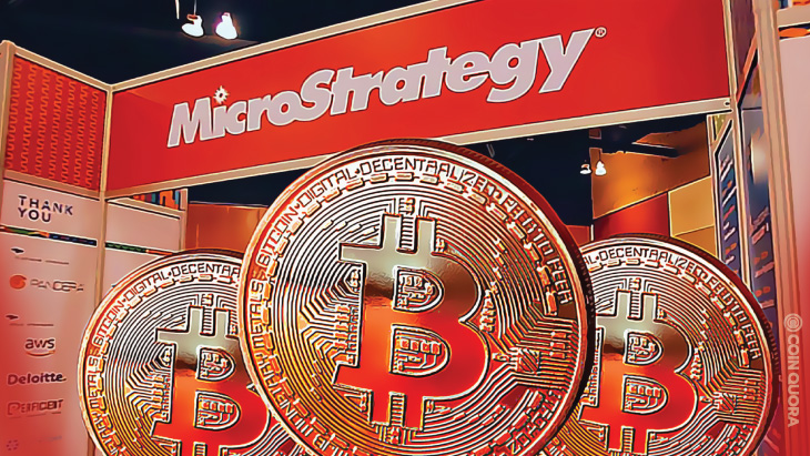 Picture of MicroStrategy with three bitcoins in front of it