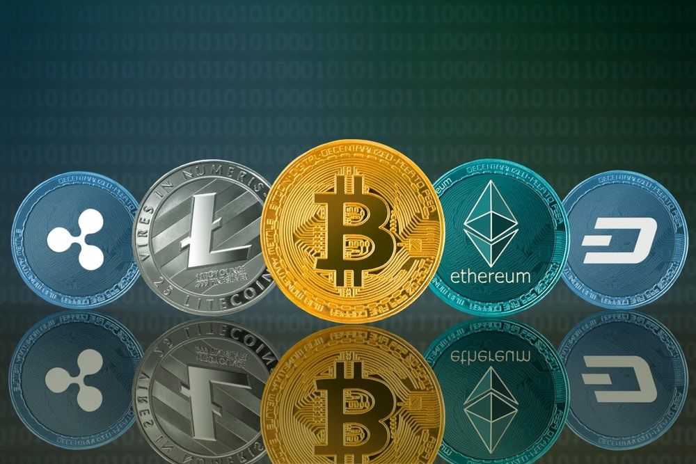 Picture of five crypto coins lined up
