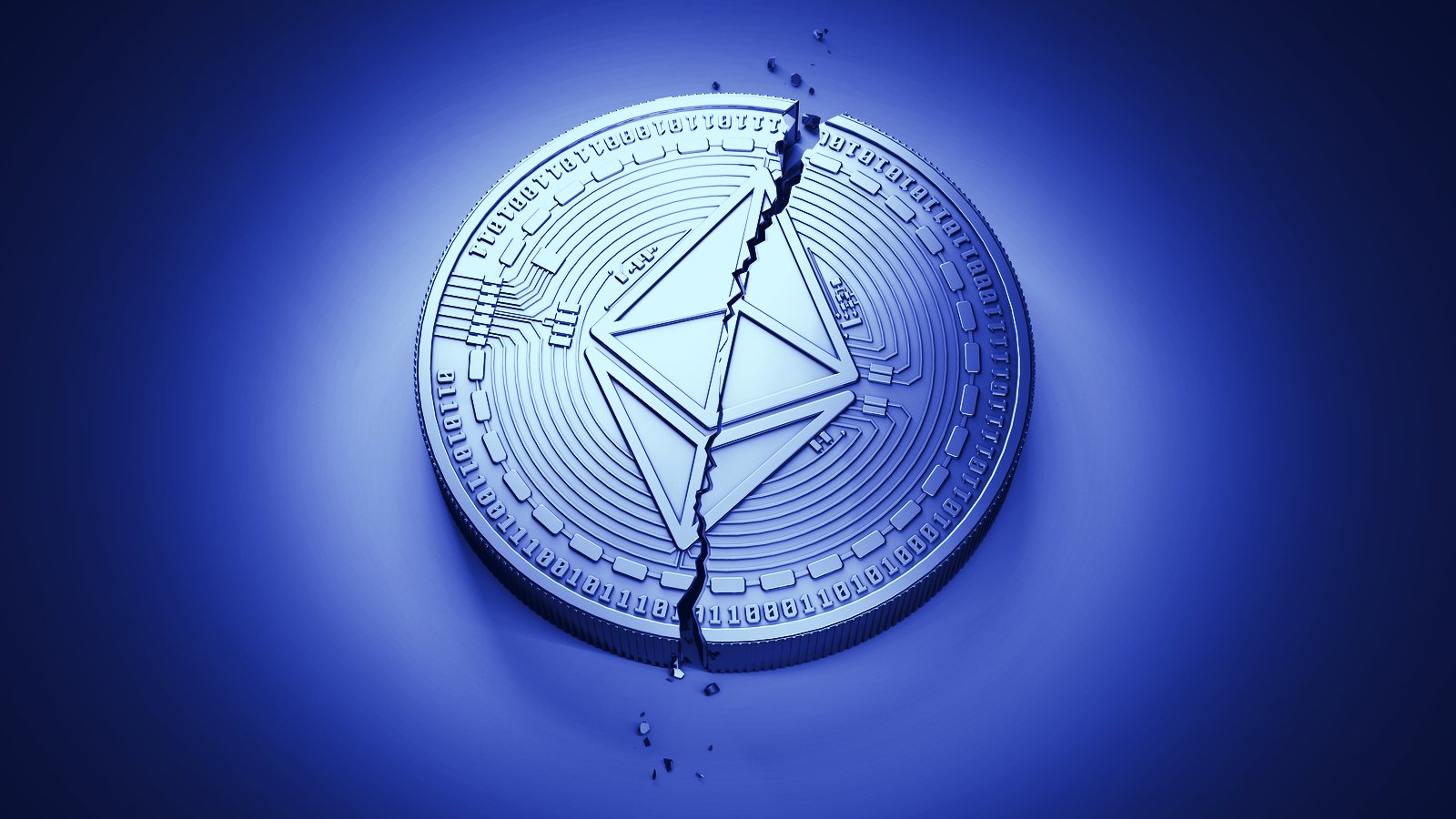 Picture of an Ethereum coin with a crack through the middle of it