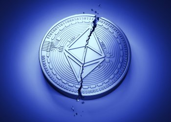 Picture of an Ethereum coin with a crack through the middle of it