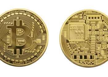 Picture of a gold bitcoin showing the front and back of the coin