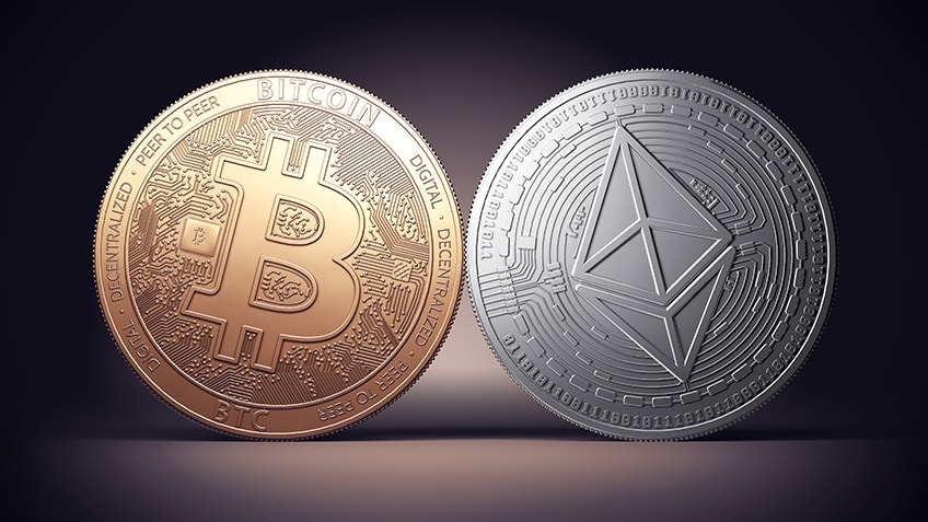 Picture of an Ethereum and Bitcoin next to each other