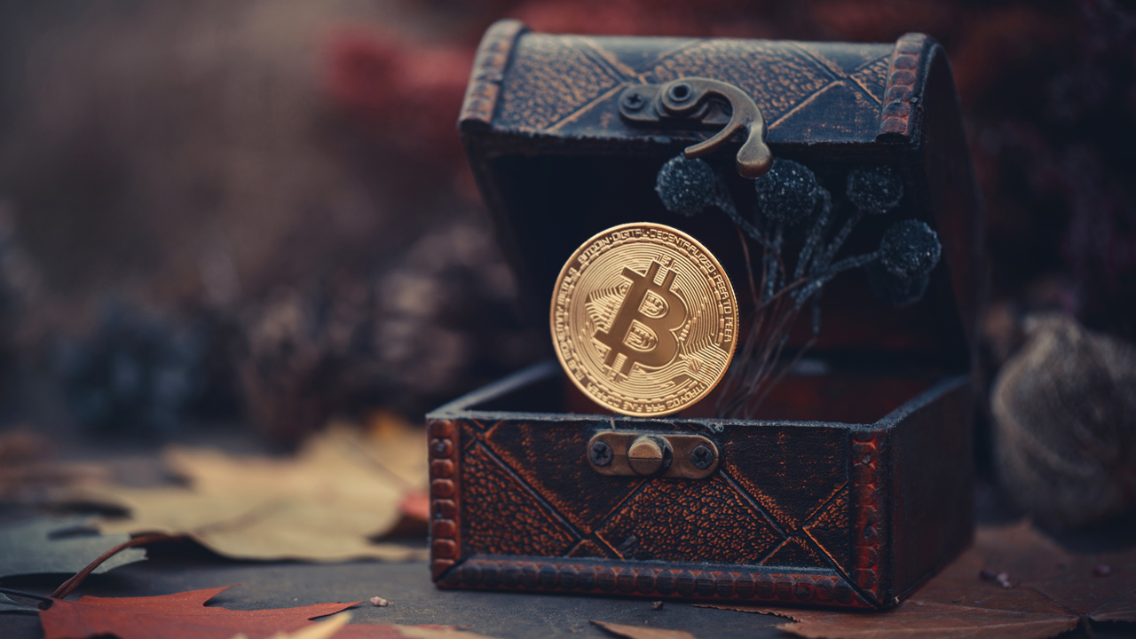 Picture of a bitcoin in a treasure chest