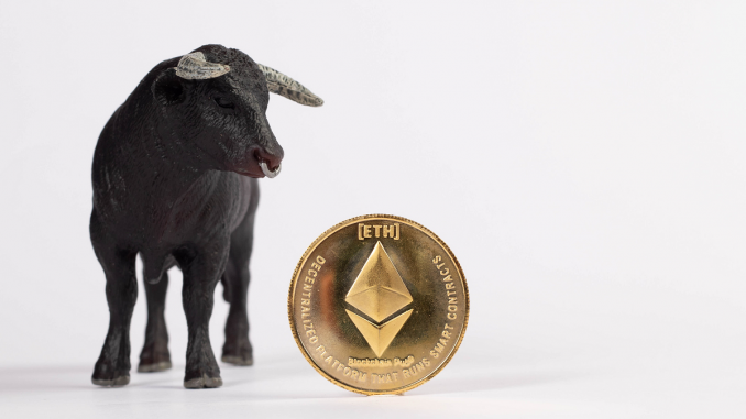 Picture of a bull standing next to an Ethereum coin