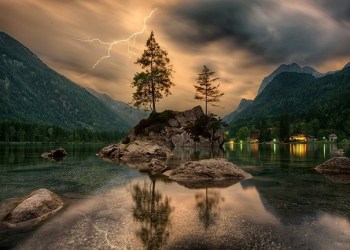 Lightning, a lake under a thunderstorm