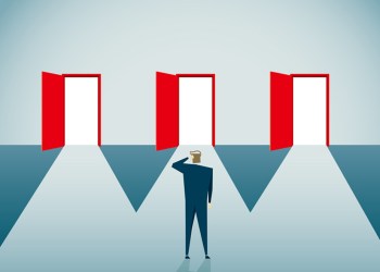 Man choosing between three doors