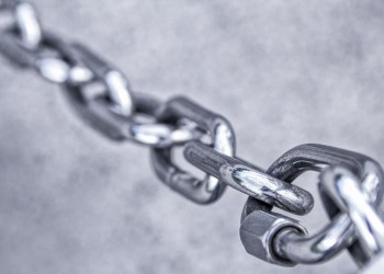 On-Chain, a single chain, black and white