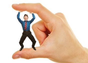 man being squishes between two fingers