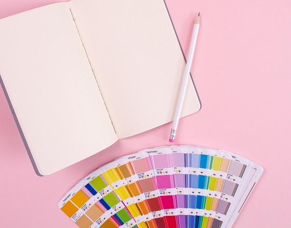 Branding, a notebook and pantone cards