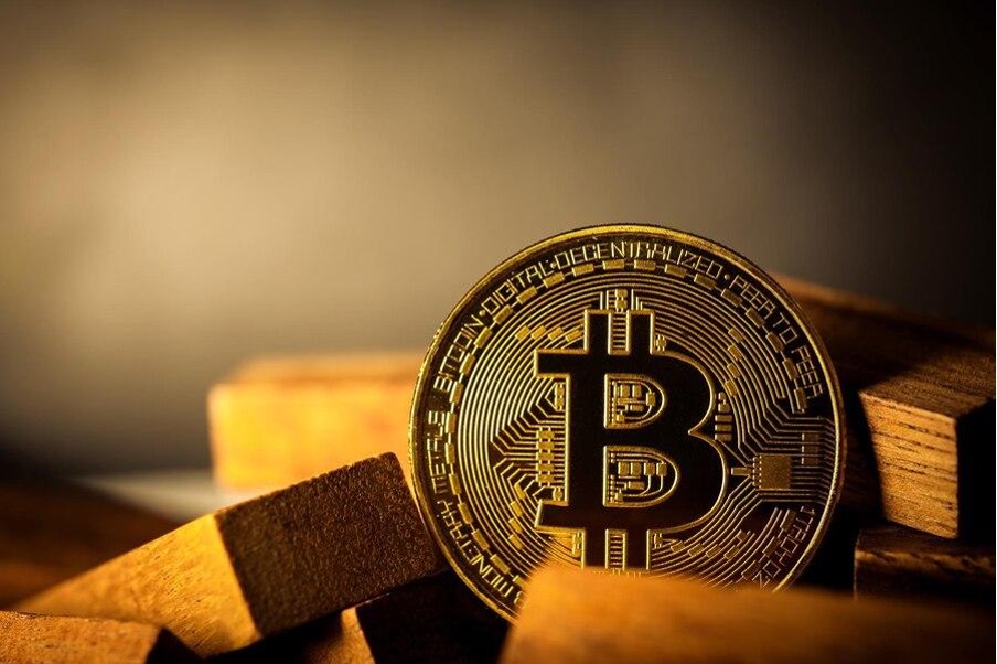 View of Bitcoin BTC with wooden blocks