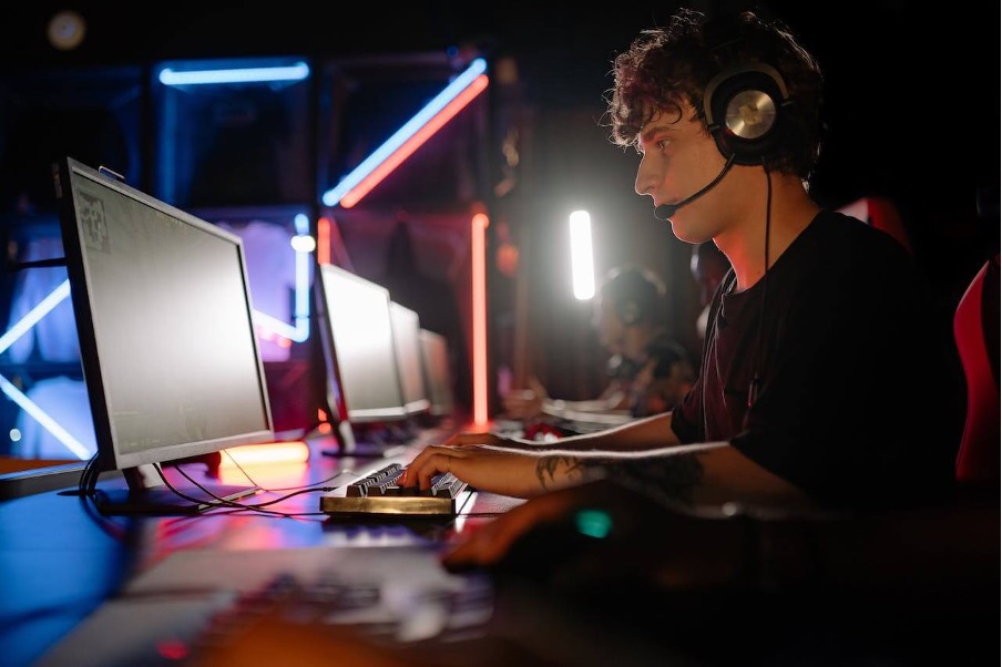 a guy is playing video game