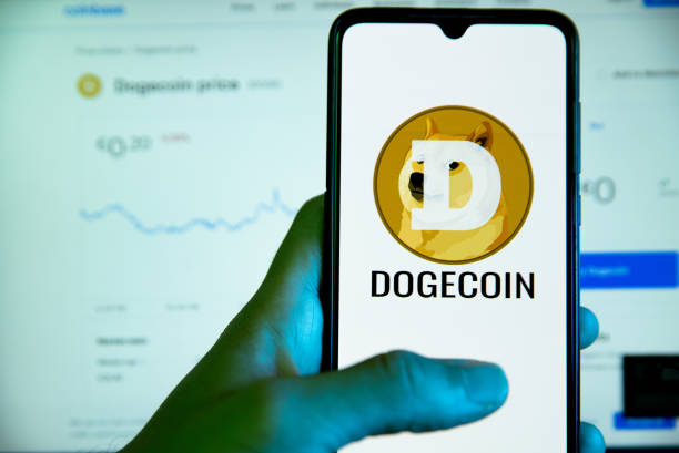 Dogecoin Caught In Compression: Descending Triangle Warns Of Potential Collapse